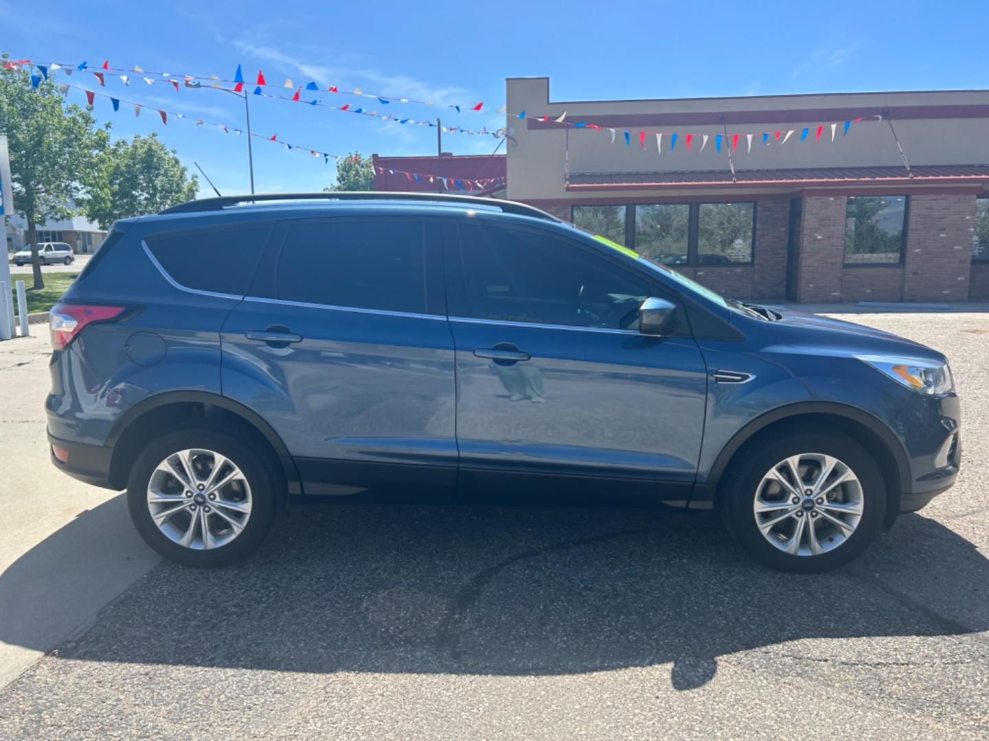 2018 BLUE Ford Escape SEL (1FMCU9HD6JU) with an L4, 1.5L engine, Automatic transmission, located at 3030 CY Ave, Casper, WY, 82604, (307) 265-3830, 42.827816, -106.357483 - Photo#4